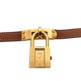 Hermes Kelly Watch, Ladies' Gold and Brown Quartz Watch with Padlock — Very Good