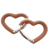 Hermes Like new Hermès Au Coeur du Faubourg COEUR DU FAUBOURG 500243FKAU earrings in Swift leather, palladium gold, 1401 — Like New