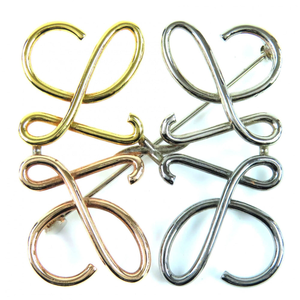 LOEWE Anagram Brooch in 4 Colors: Gold, Silver, Bronze. Comes with dust bag. Highly popular and recommended for women — Like New