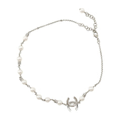 Chanel necklace with Coco Mark, faux pearl and rhinestone design. CHANEL for women — Like New