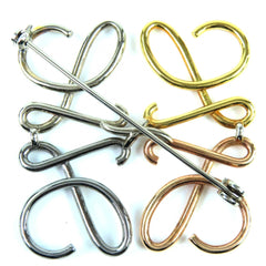 LOEWE Anagram Brooch in 4 Colors: Gold, Silver, Bronze. Comes with dust bag. Highly popular and recommended for women — Like New