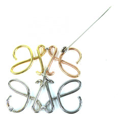 LOEWE Anagram Brooch in 4 Colors: Gold, Silver, Bronze. Comes with dust bag. Highly popular and recommended for women — Like New