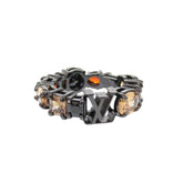 Like new Louis Vuitton M1202L metal ring with colored stones and black accents, model LV 1243 — Like New