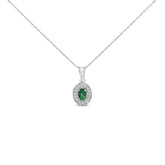 14K White Gold Oval 6x4 MM Green Emerald and Diamond Halo Pendant Necklace - 18 inch