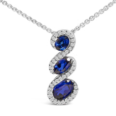 .925 Sterling Silver Created Blue and White Sapphire 3 Stone Swirl Pendant Necklace