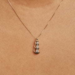 10k Yellow Gold 1/4 Cttw Diamond 3 Stone Swirl and Drop Pendant Necklace