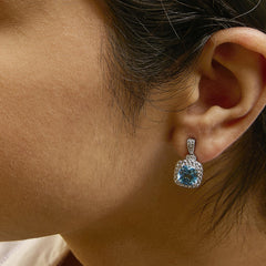 Sterling Silver 8x8mm Cushion Cut Blue Topaz and Diamond Accent Drop Earrings