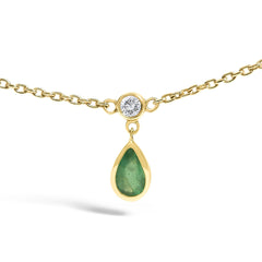 10K Yellow Gold Dangling 5x3 mm Green Emerald and Diamond Station Necklace - 18" Inches