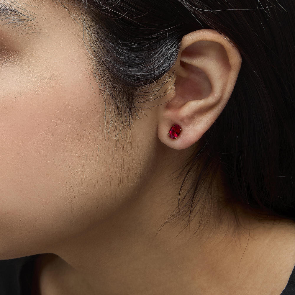 18K Yellow Gold 7x5 MM Created Oval Ruby Solitaire Stud Earrings