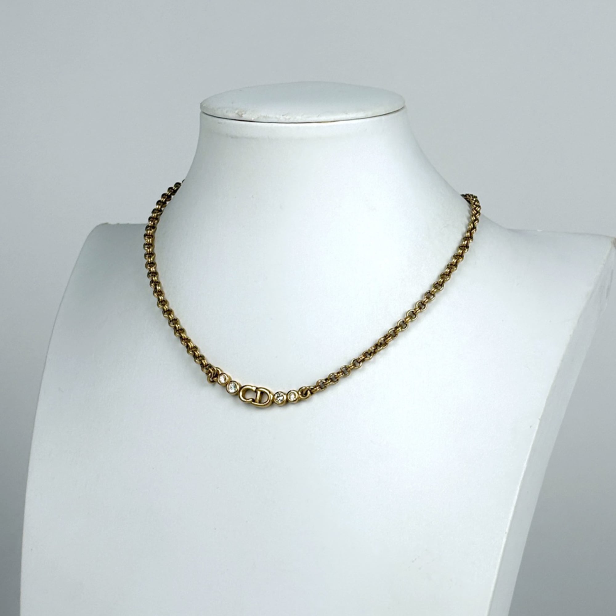 Christian Dior logo chain necklace with CD and rhinestones, GP gold, for women.