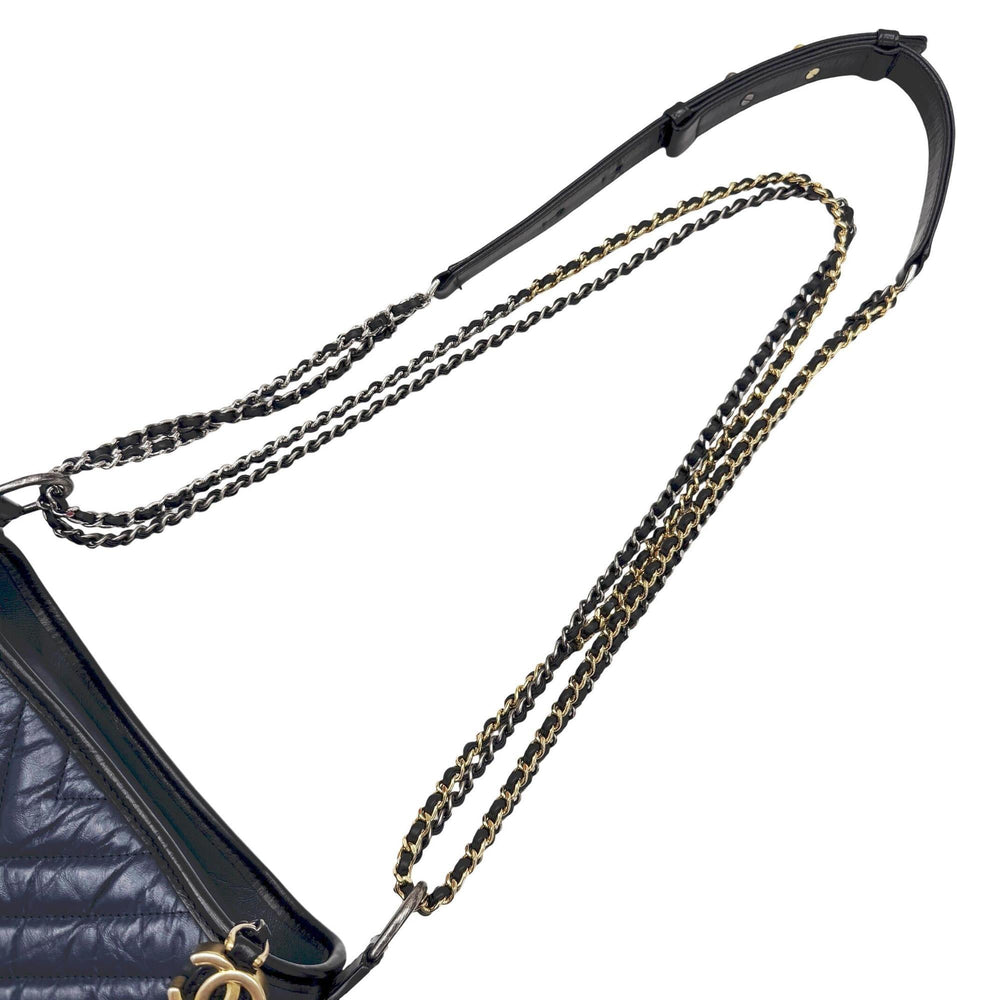 CHANEL Gabrielle de Small Hobo V-stitch Chevron Calfskin Shoulder Bag for Women (Navy/Black) — New - Store Return