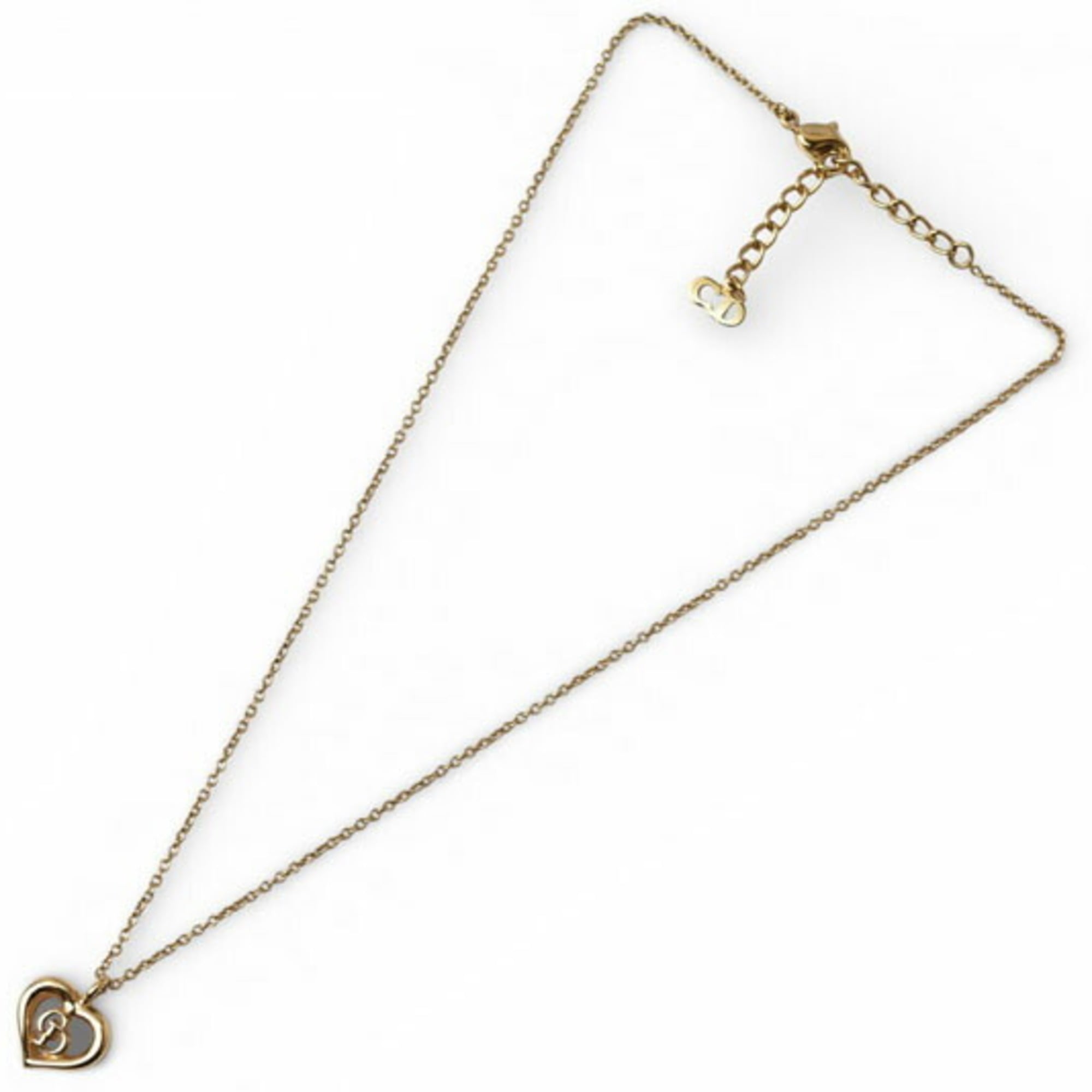 Christian Dior necklace pendant with heart motif in gold