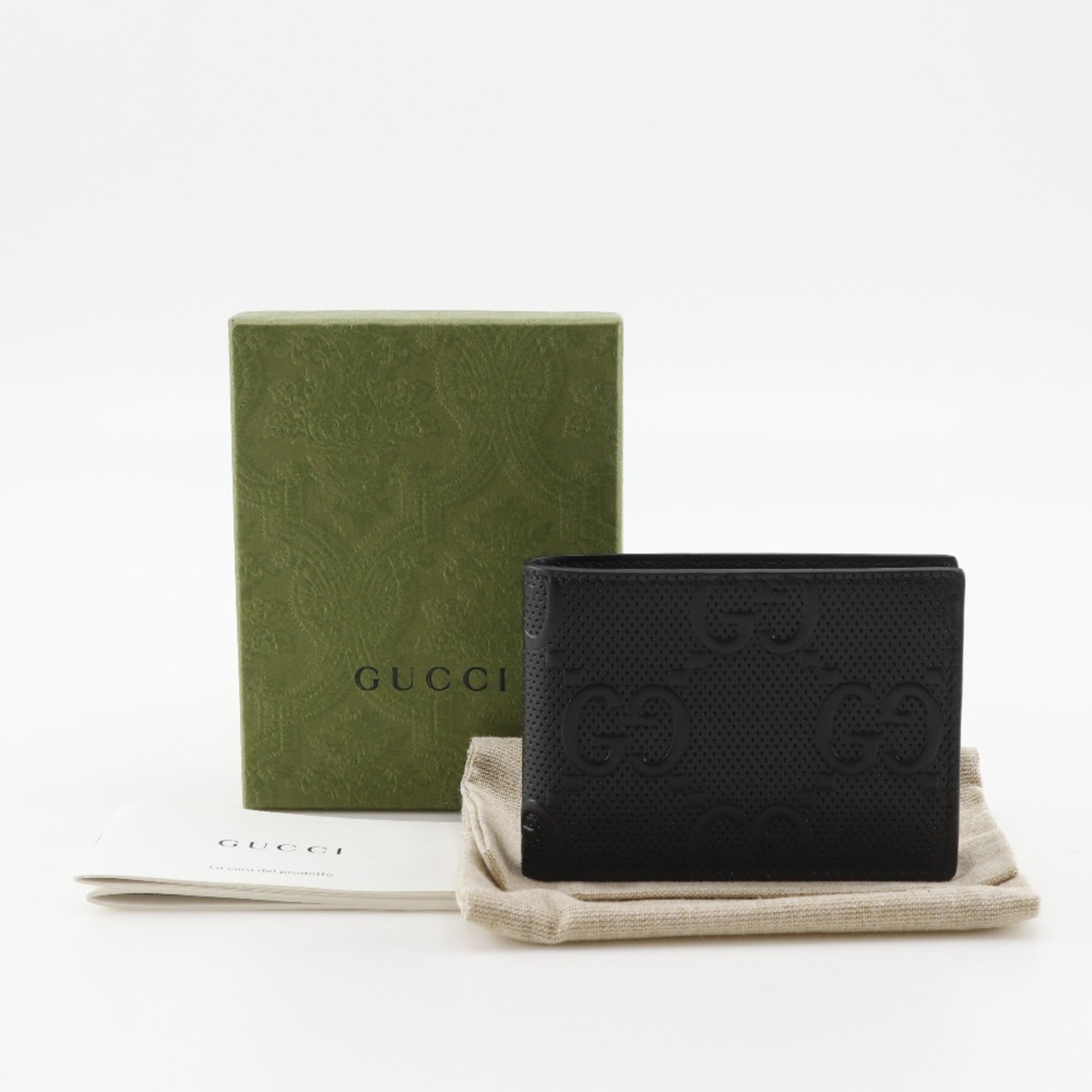 Gucci GG embossed bifold billfold 625559 in black calfskin with an open pattern for men