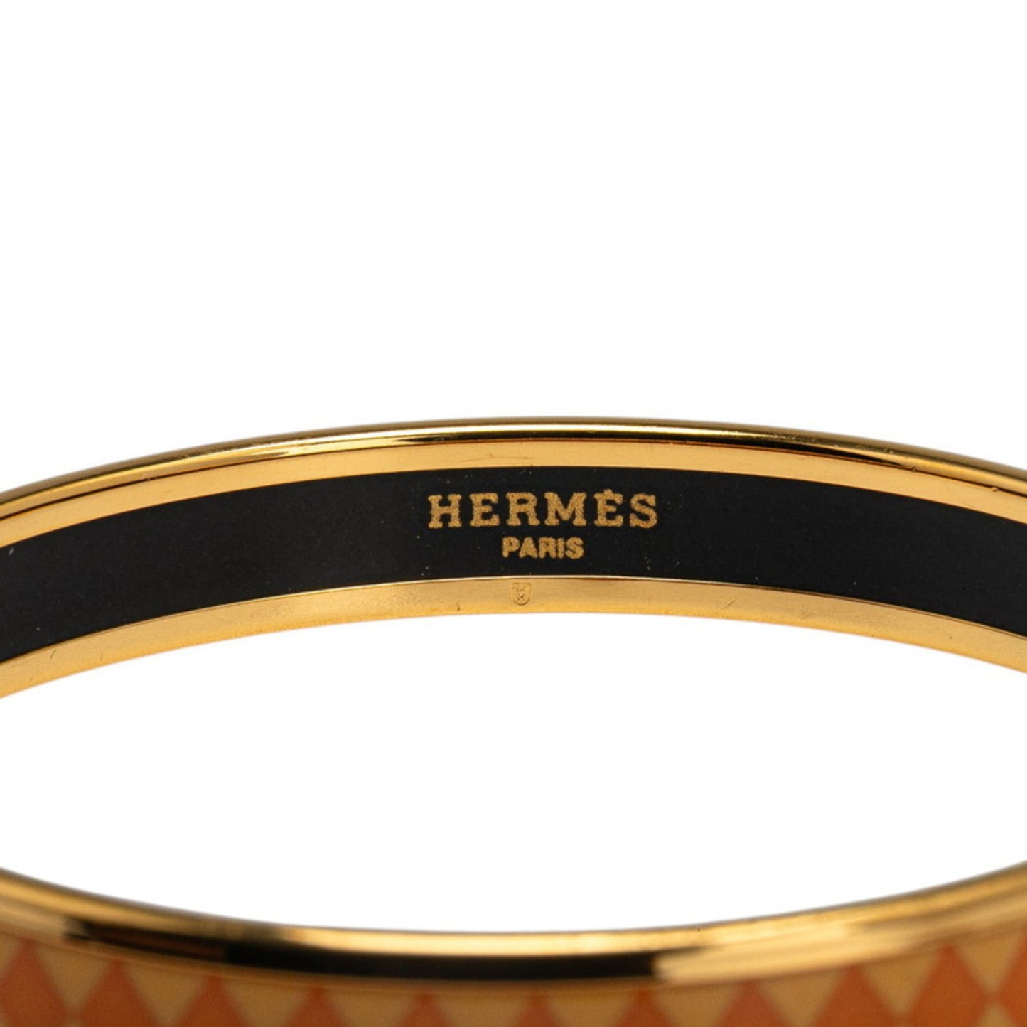 Hermes enamel PM diamond motif bangle in orange and gold plated for women.