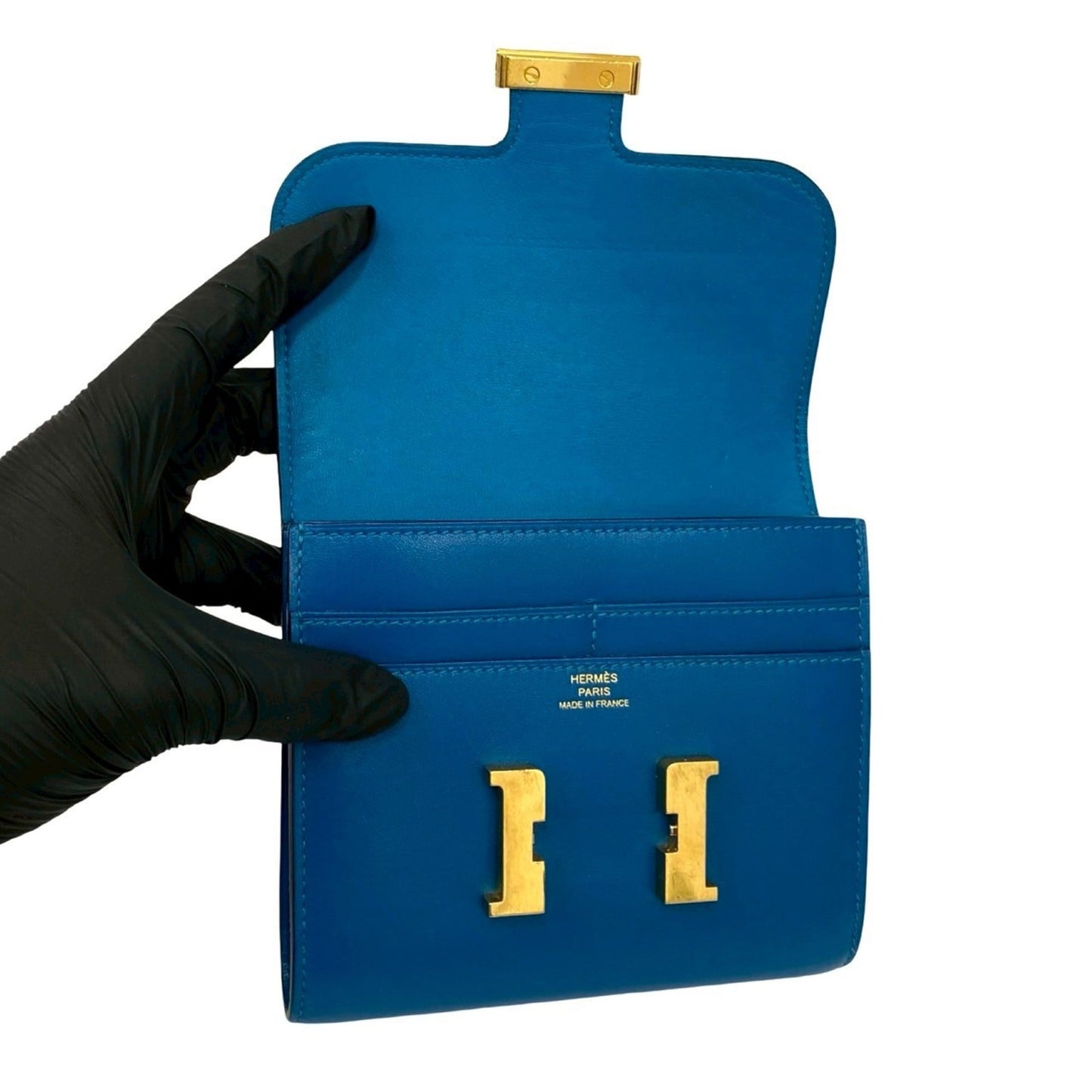 A stamped HERMES Constance Compact Calf Leather Bi-fold Wallet Blue 28793