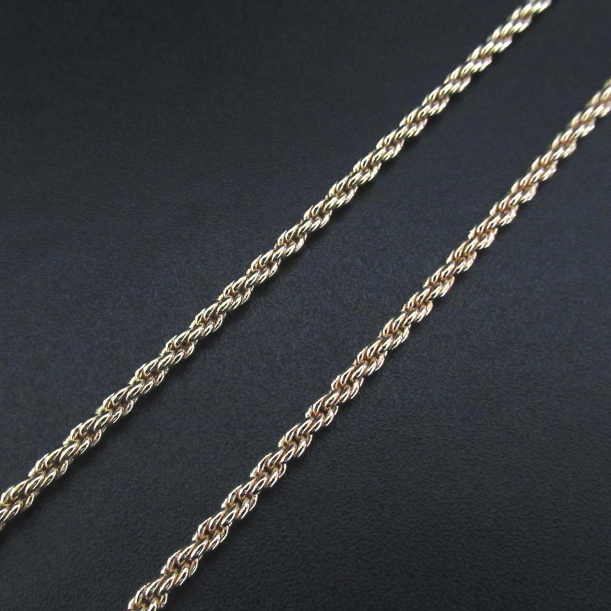 Vintage Christian Dior logo long necklace in gold.