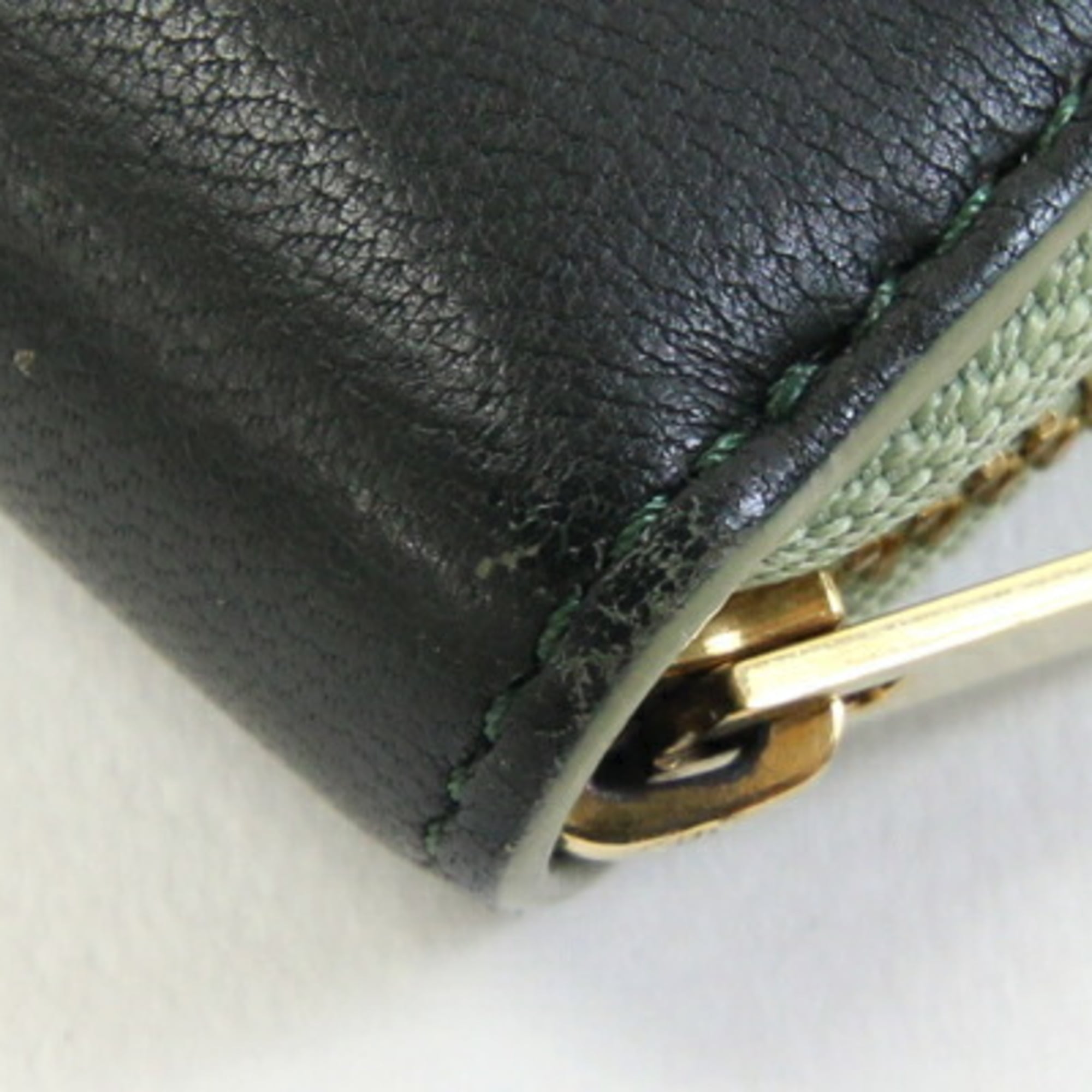 Celine round long wallet in light green and dark leather. Two-tone zip closure. Women's.