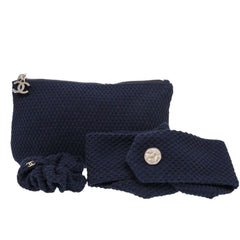 Like new Chanel 3-piece travel set including headband, scrunchie, and pouch, cotton, navy blue, 0541 CHANEL — Like New