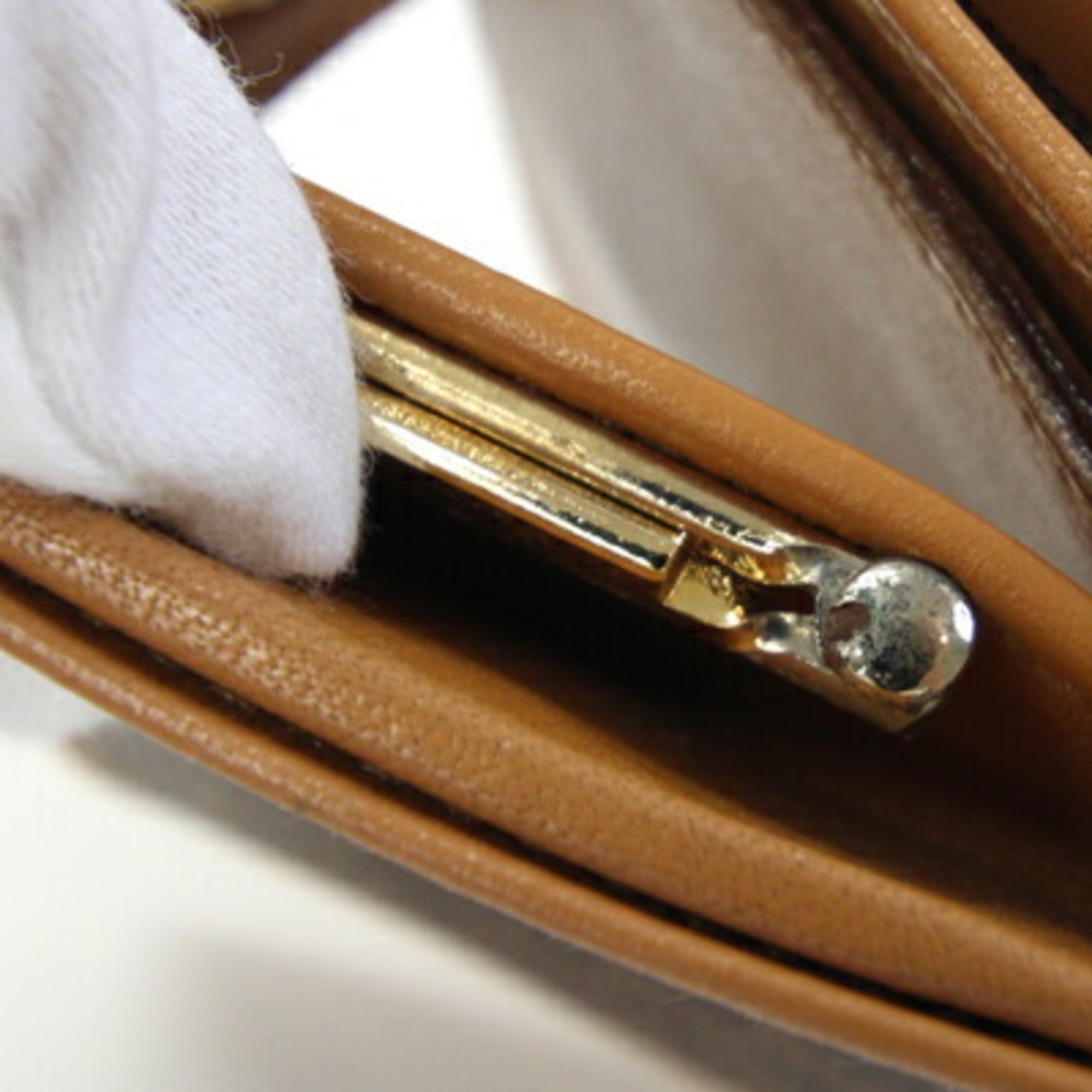 Celine bifold wallet in macadam, dark brown, beige, PVC, and leather. Compact wallet/mini wallet. For older women.