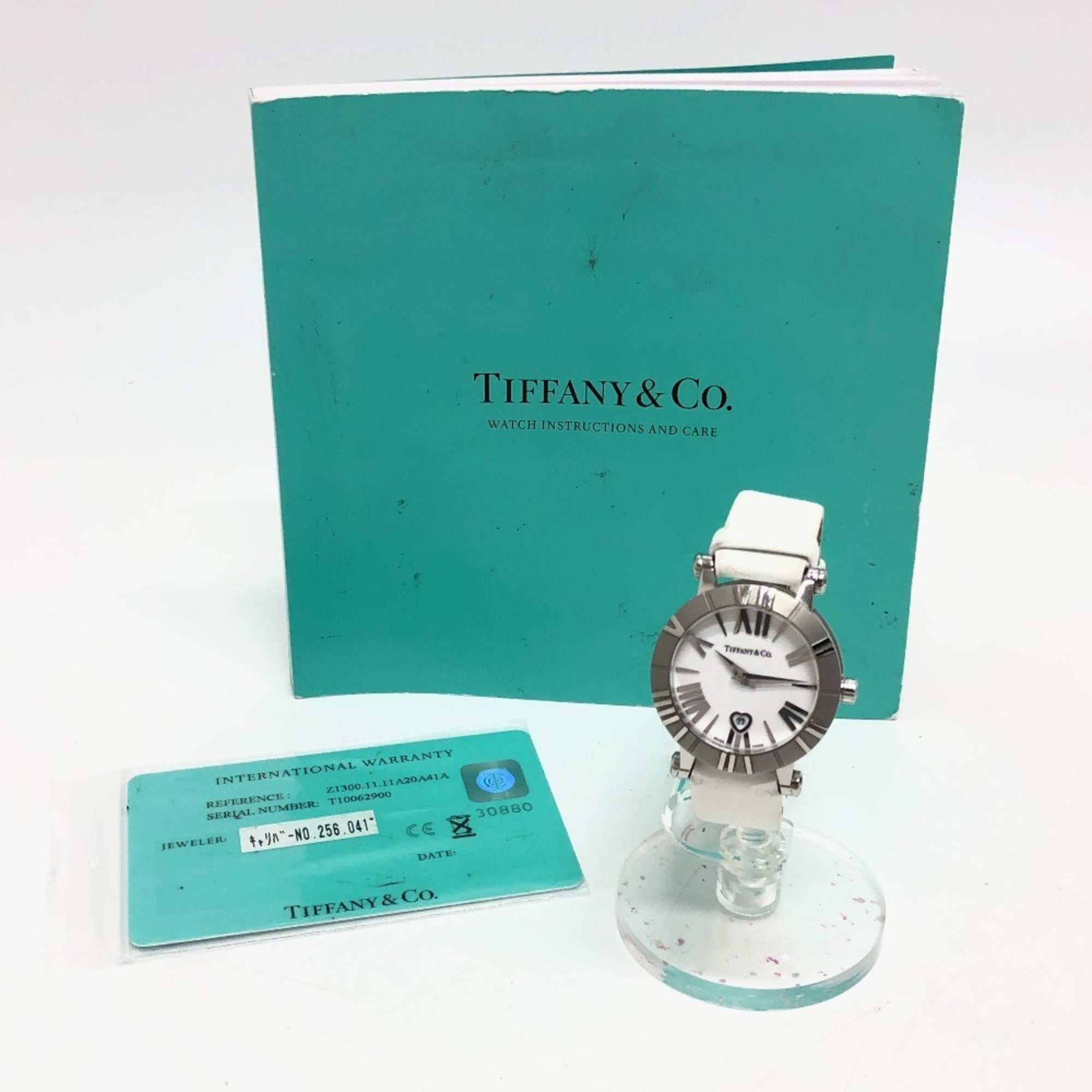 TIFFANY & Co. Z1300.11.11A20A41A White Ceramic Atlas Quartz Date Watch with Stainless Steel and Leather Strap, Silver — Good