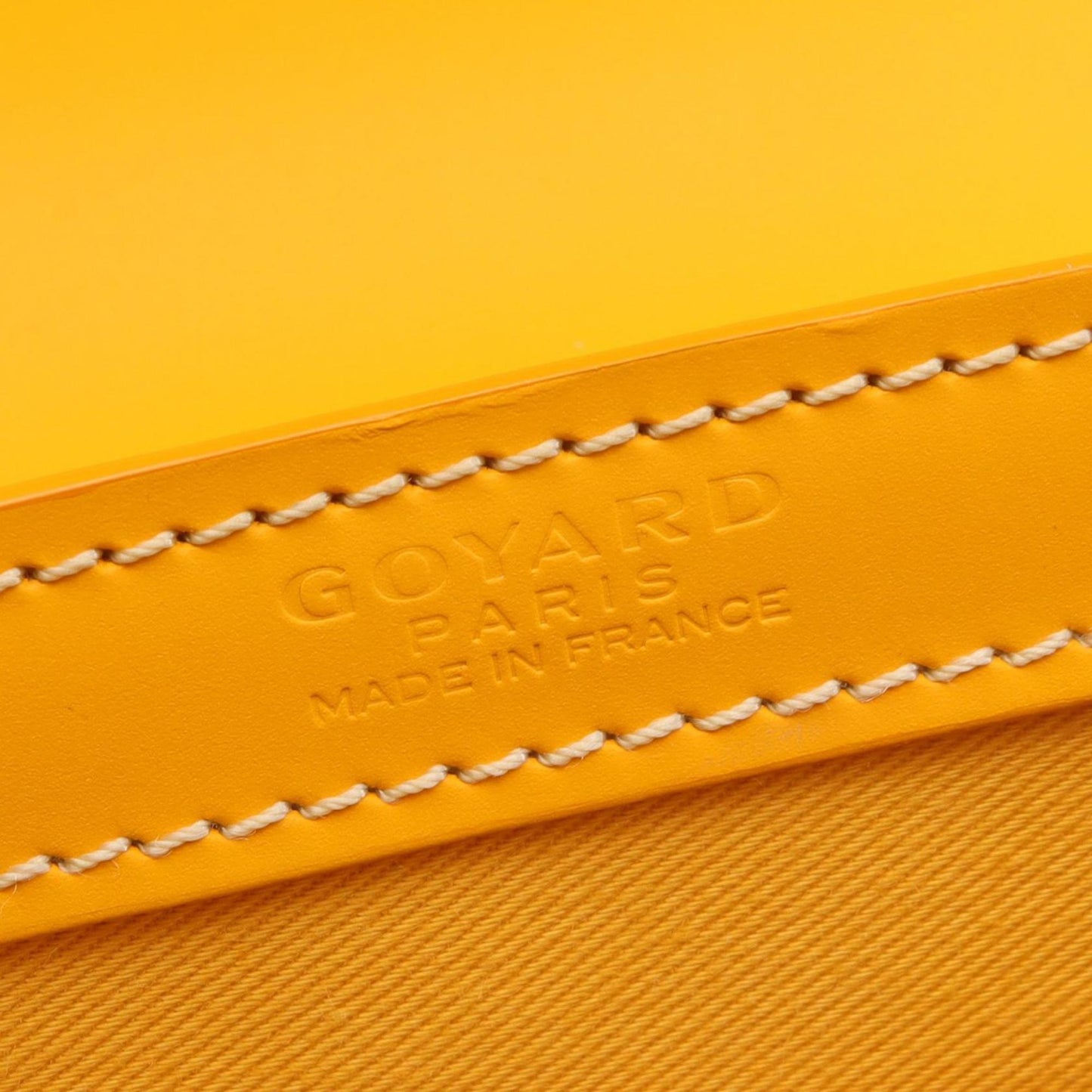 Goyard Saigon PM handbag in coated canvas and leather, available multicolored yellow.