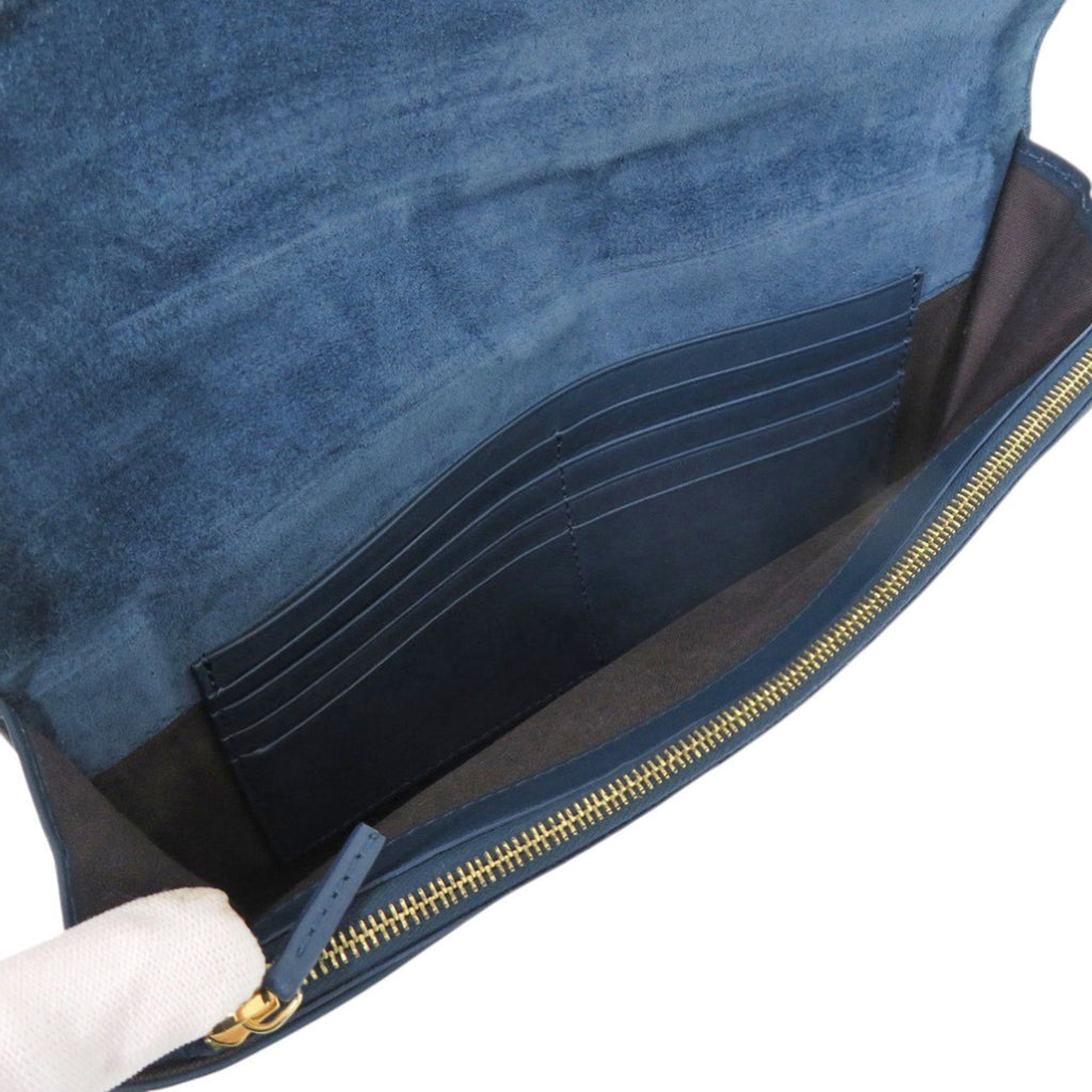 Excellent condition Fendi Pecan pattern clutch bag 8M0284 in leather and canvas, blue brown. 0475FENDI