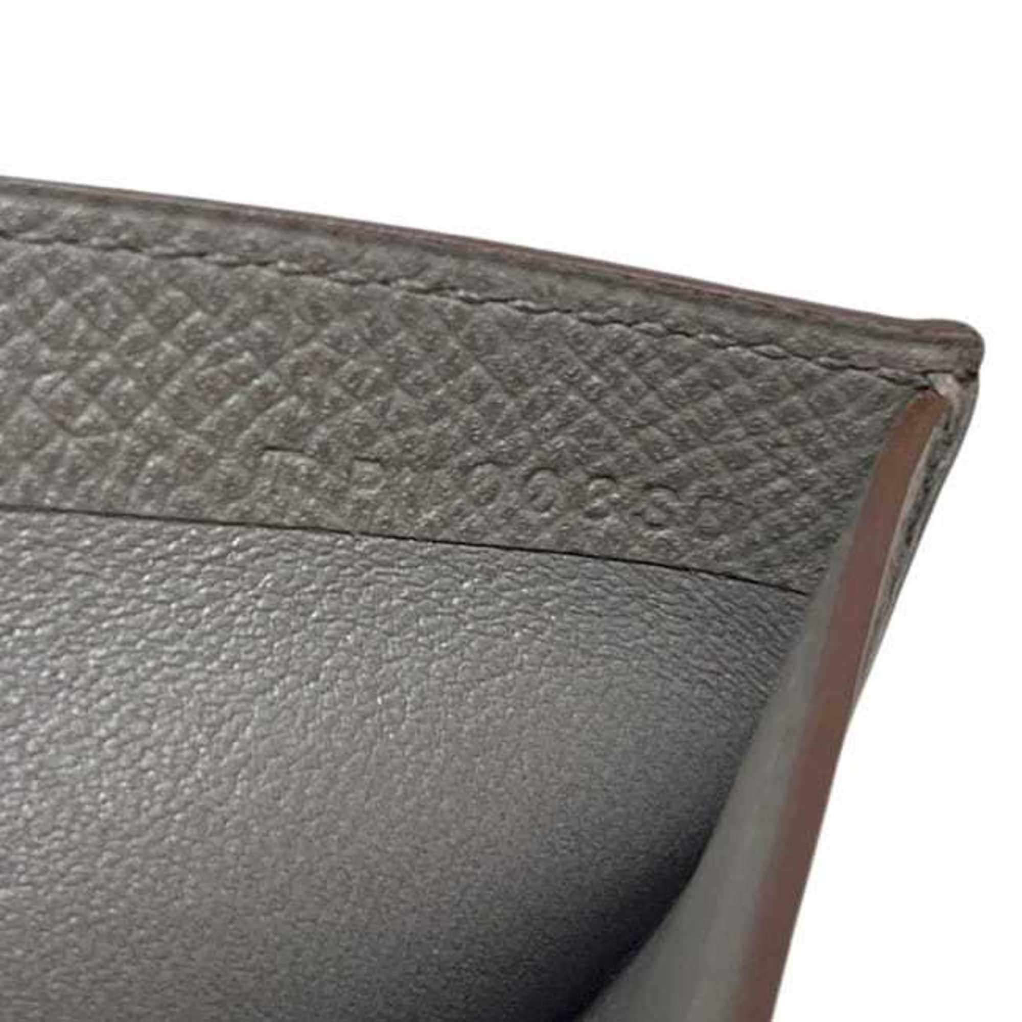 Hermes Hermès MC Fleming bifold wallet (f-24632) in greige leather with Epson Tourtiere logo and T-stamp. This genuine grained is available gray beige. Suitable for both men women.