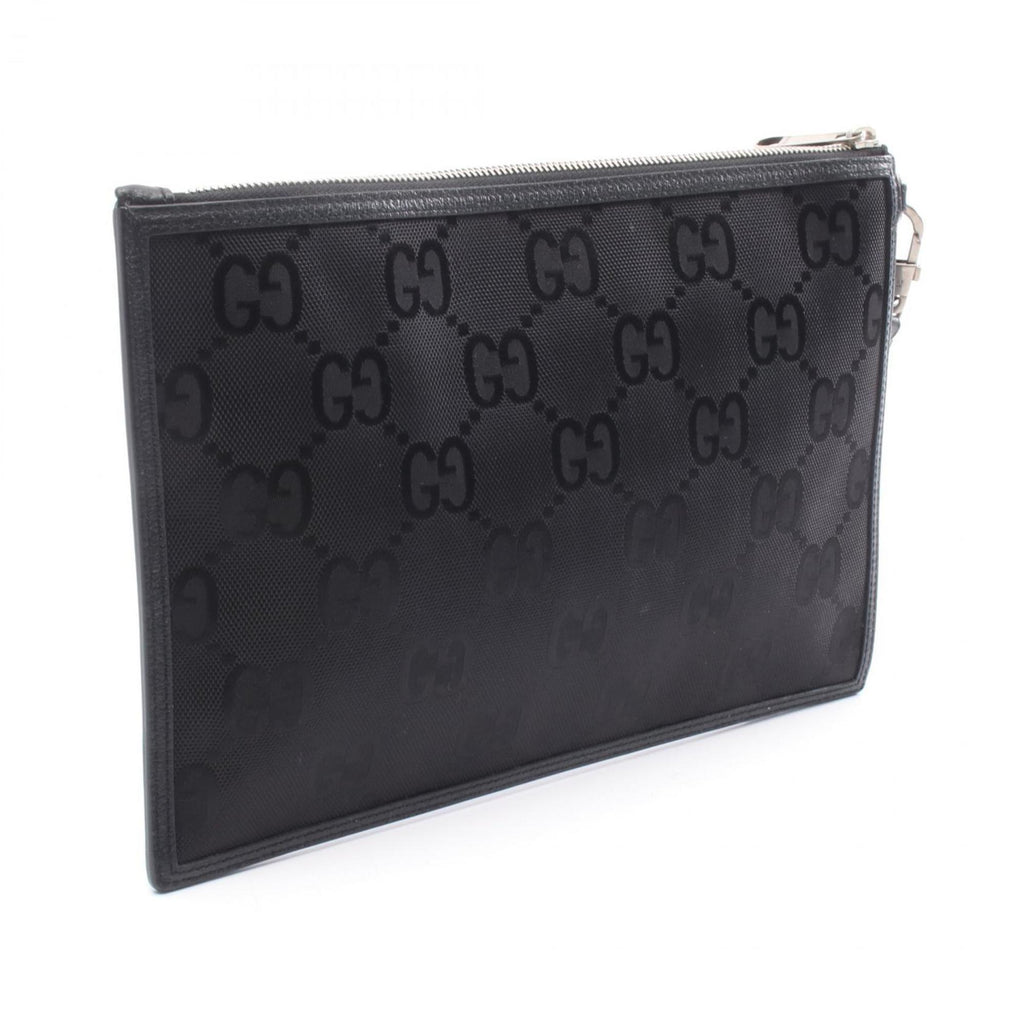 Gucci Off the Grid GG pattern clutch bag in leather and nylon canvas, black, 625598