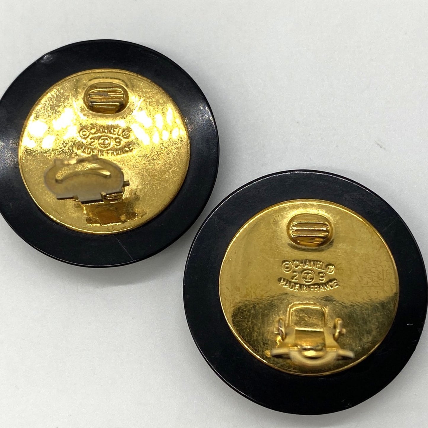 CHANEL Matelasse Coco Mark Earrings in Black and Gold