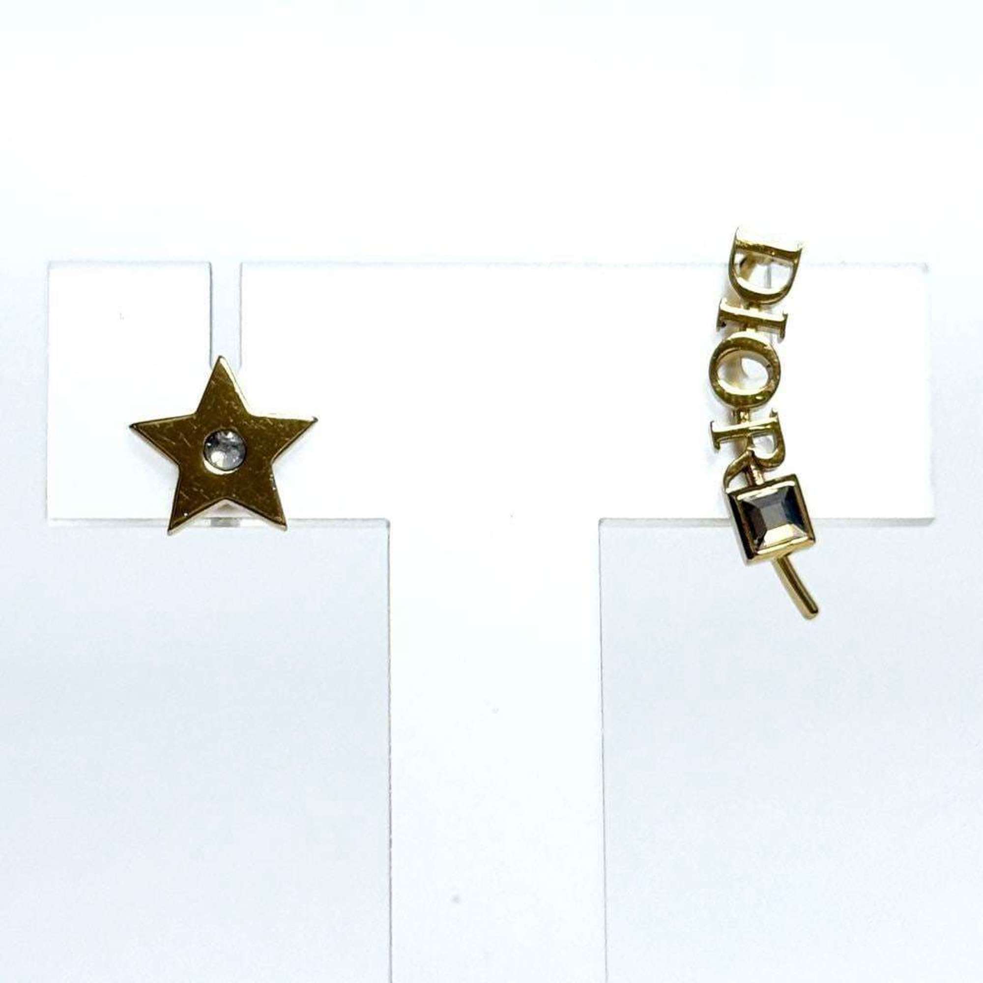 Christian Dior Dior Asymmetric Revolution Earrings Star — Like New
