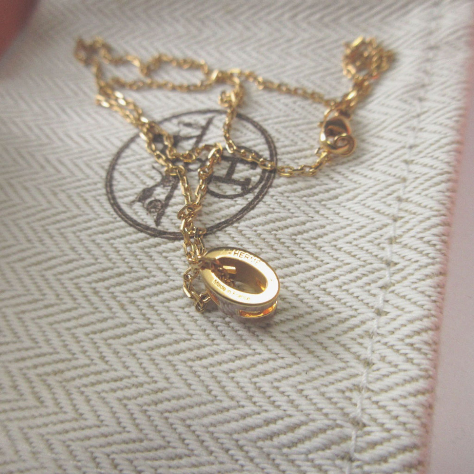 Like new Hermes Pop Ash Mini Metal New Gold Necklace 0508 — Like New