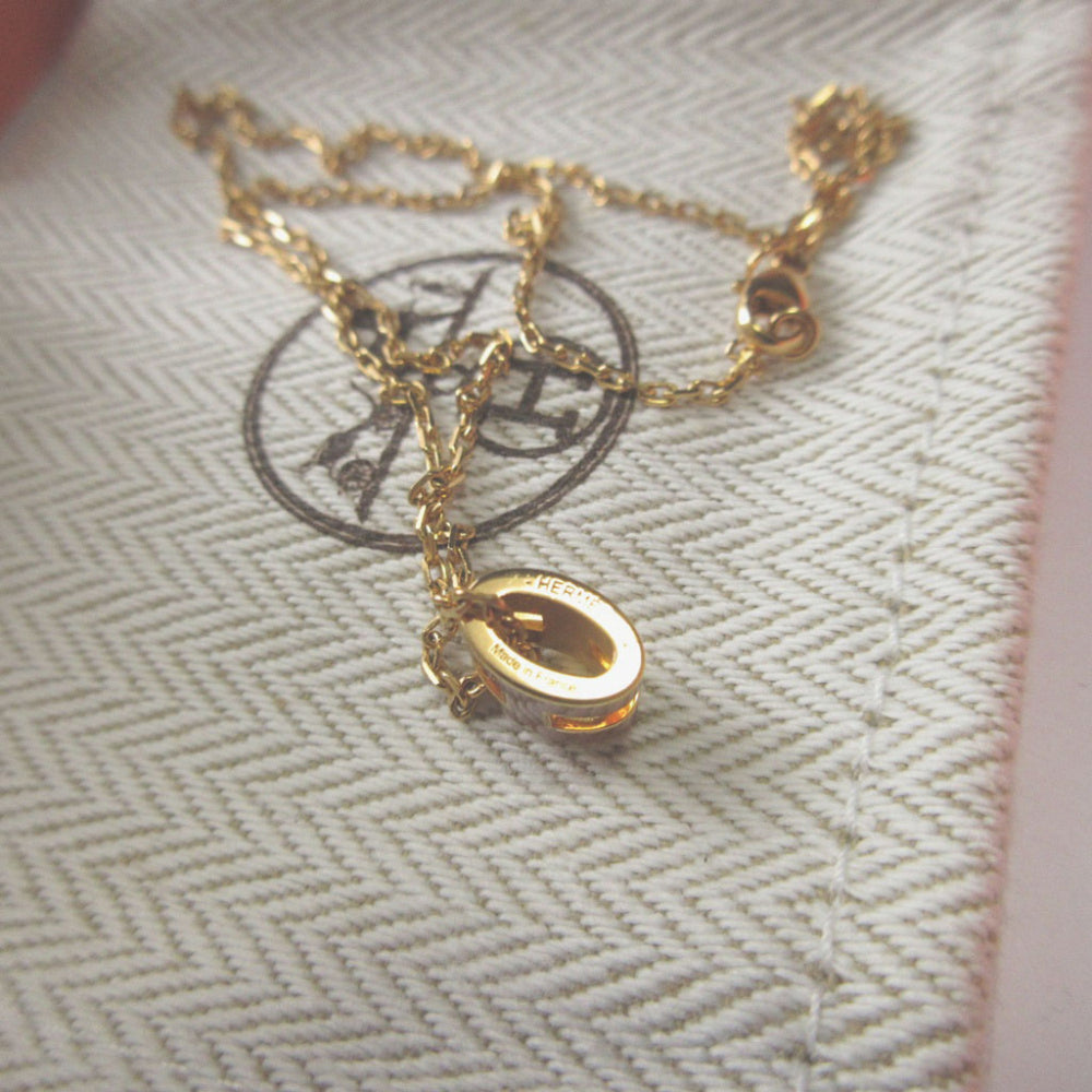 Like new Hermes Pop Ash Mini Metal New Gold Necklace 0508 — Like New