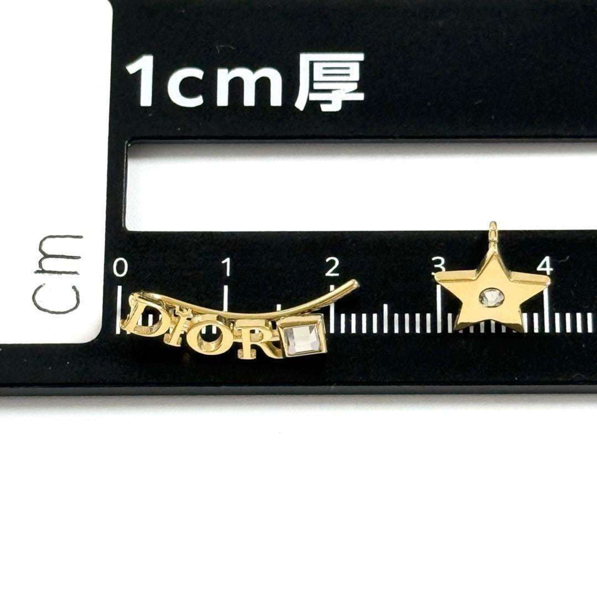Christian Dior Dior Asymmetric Revolution Earrings Star — Like New