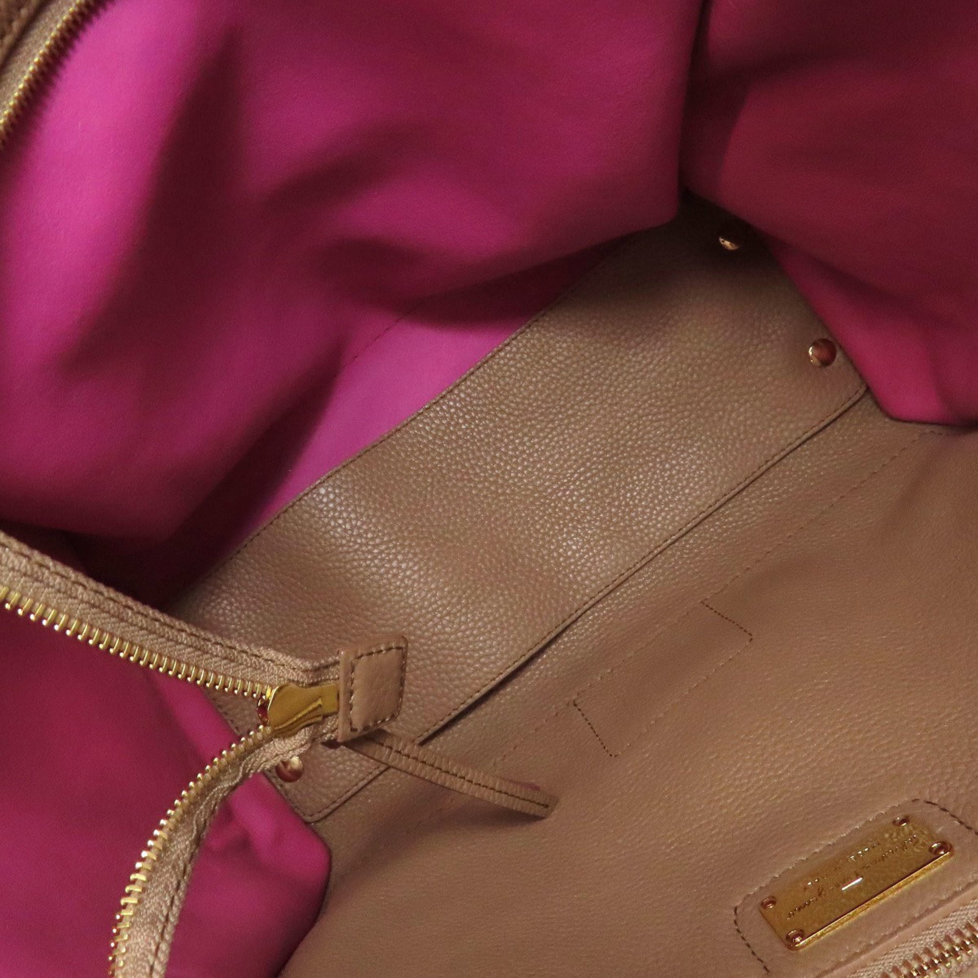 Salvatore Ferragamo Amy Gancini hardware leather tote bag for women.