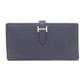 Hermes Hermès Bearn soufflet long wallet in blue indigo and rose purple with silver hardware, Epson, for women.