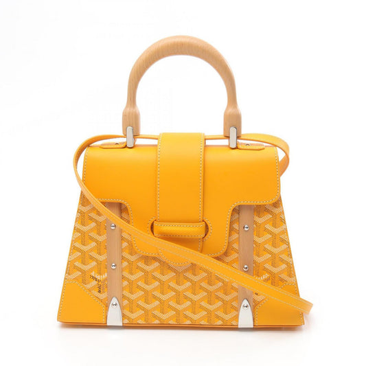 Goyard Saigon PM handbag in coated canvas and leather, available multicolored yellow.