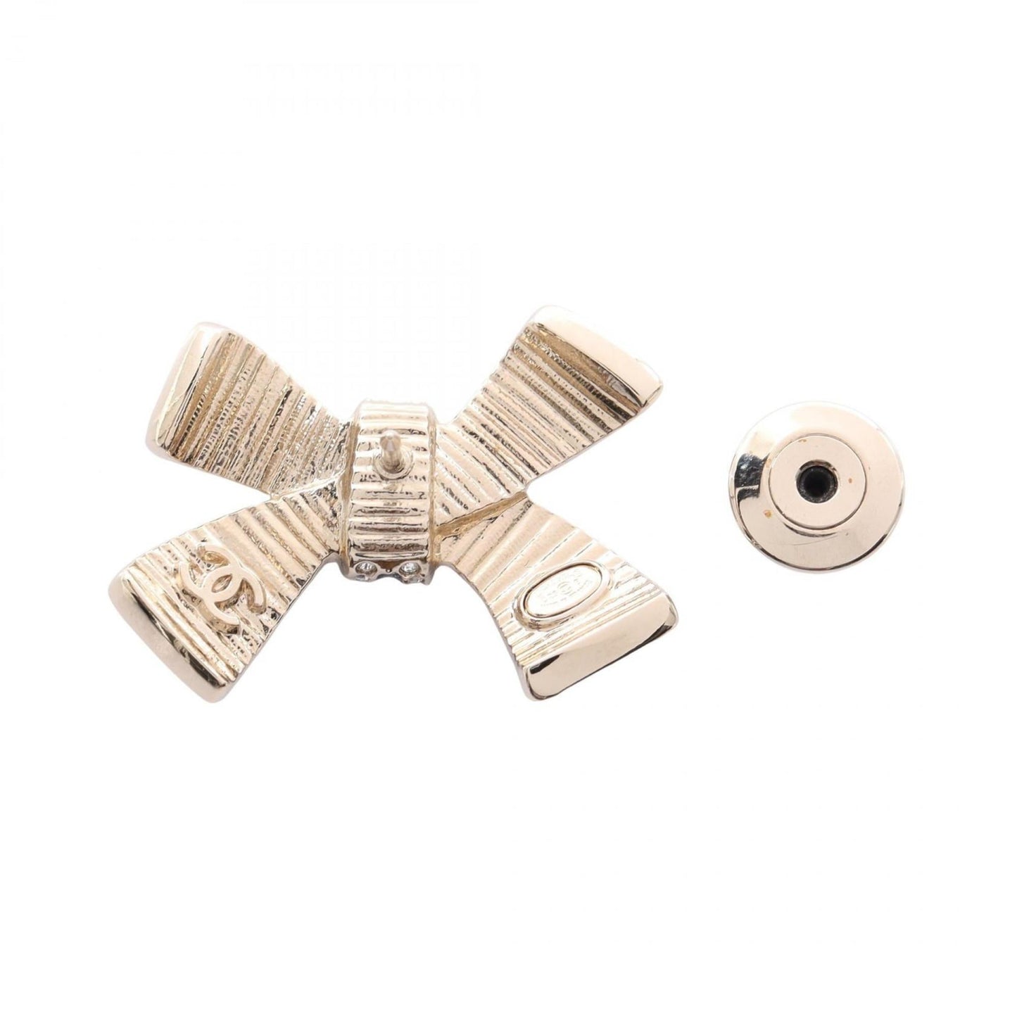 Chanel Coco Mark Ribbon Brooch with Gold-Plated Rhinestones, Available in Gold, Black, and Clear.