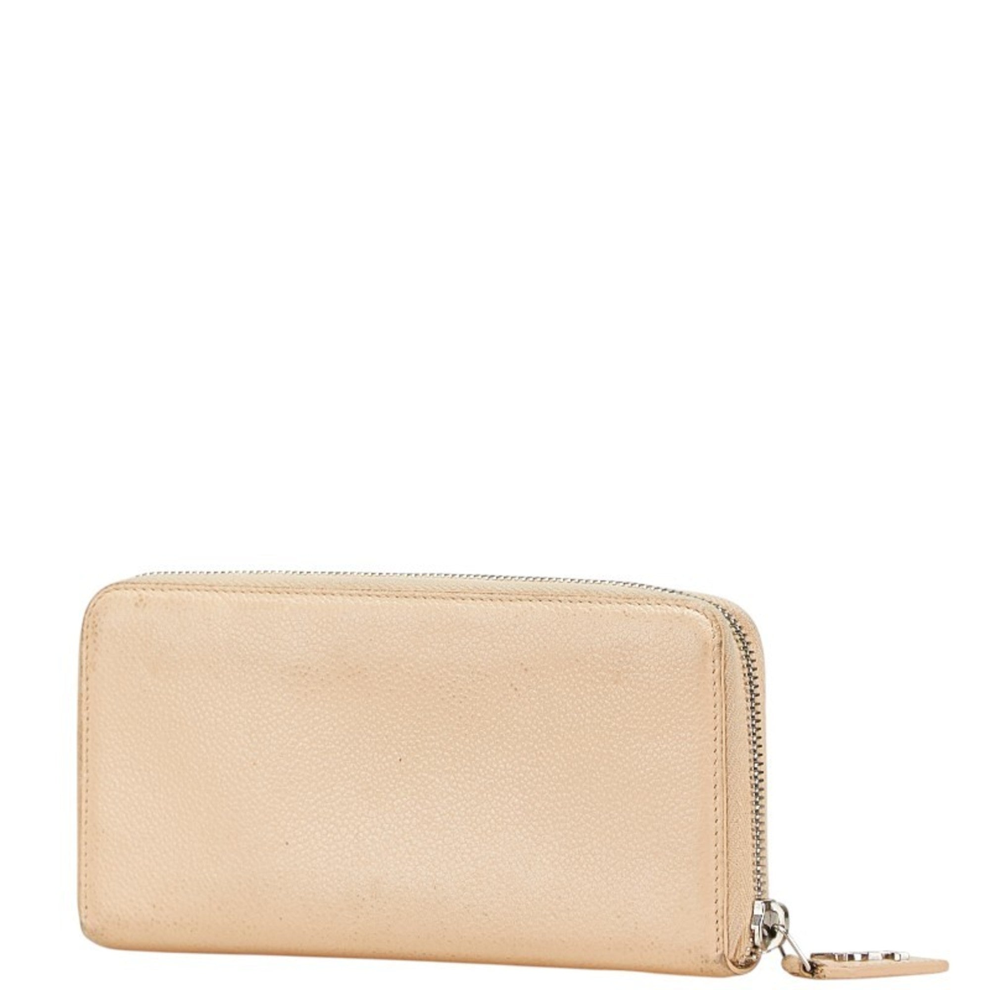 Saint Laurent round zipper long wallet in beige leather for women.