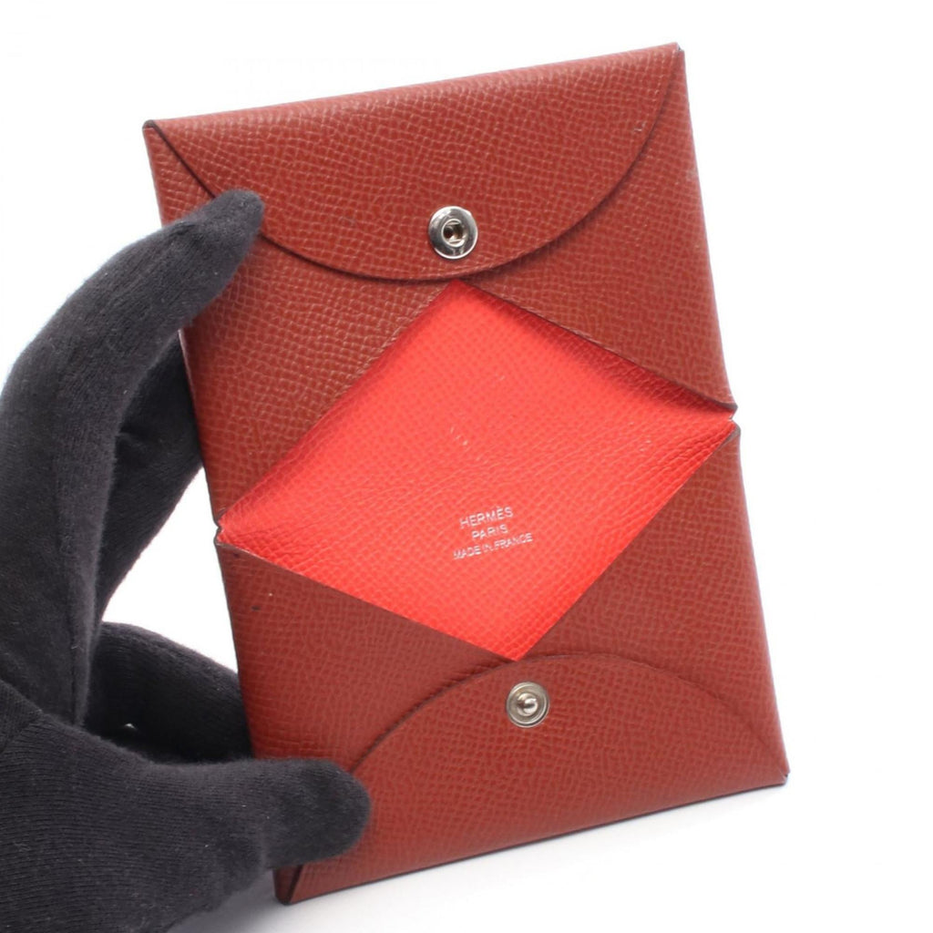 Hermes Hermès Calvi Verso wallet with coin purse, made of calfskin leather (cowhide), in Bordeaux.