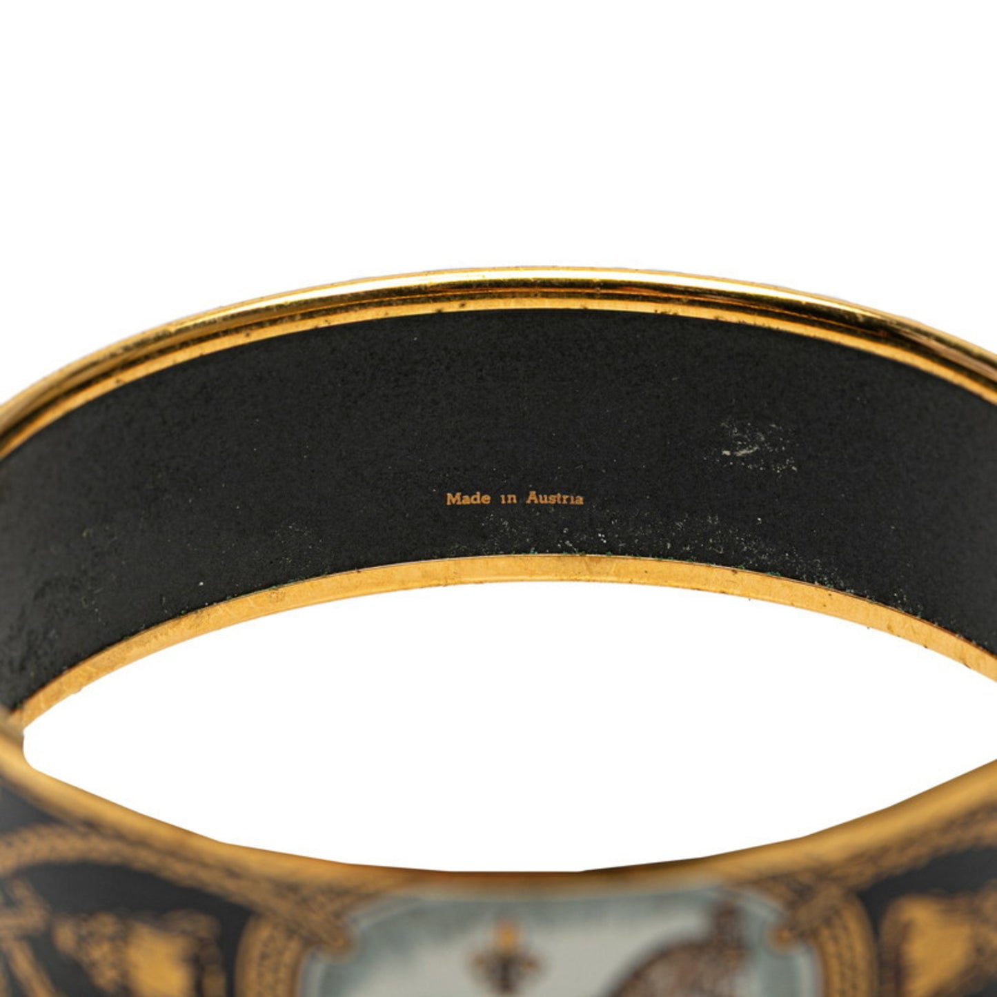 Hermes enamel GM cloisonné horse motif bangle in gold, black, and multicolored plating for women.