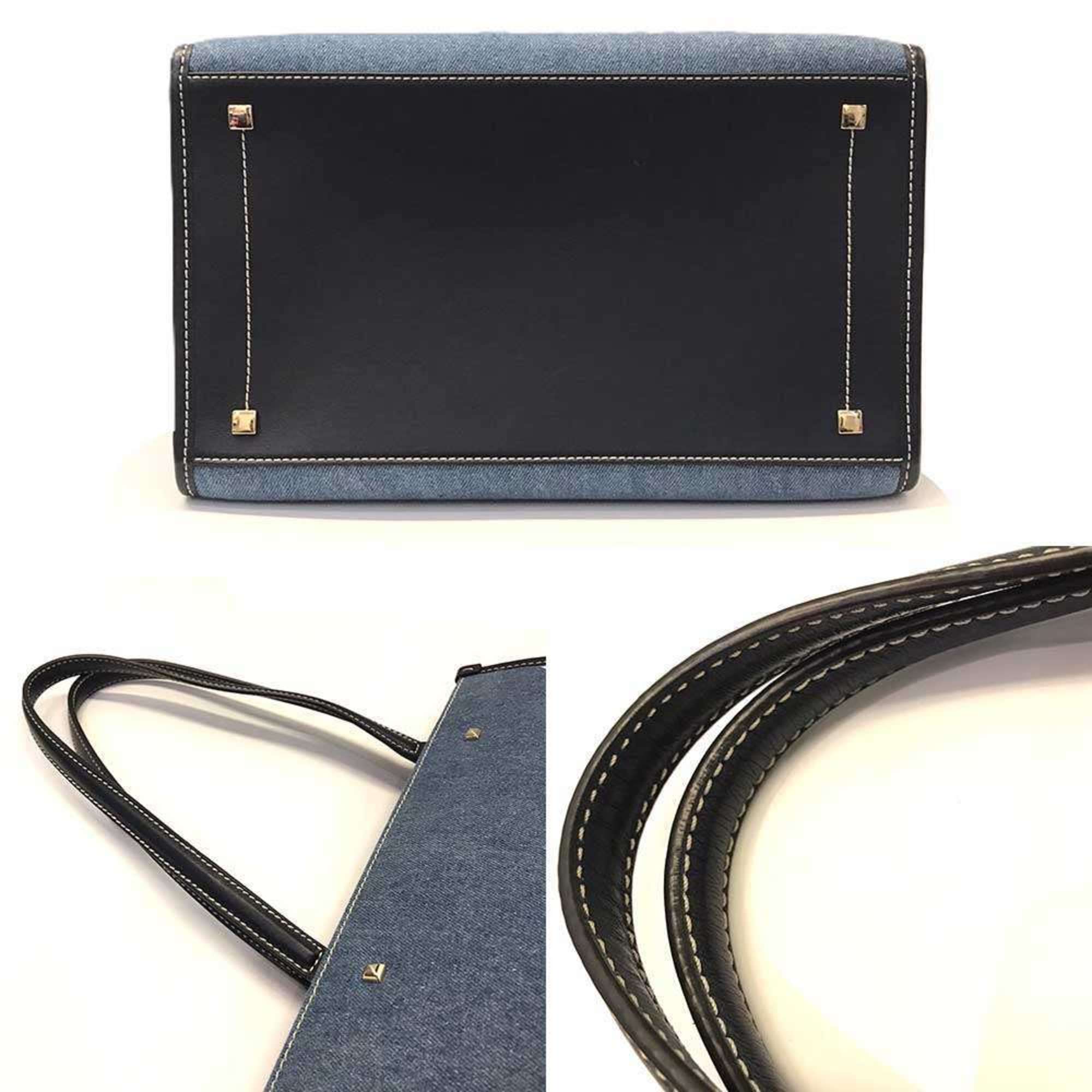 Jimmy Choo Varenne denim tote bag with embroidery and studs in indigo blue.