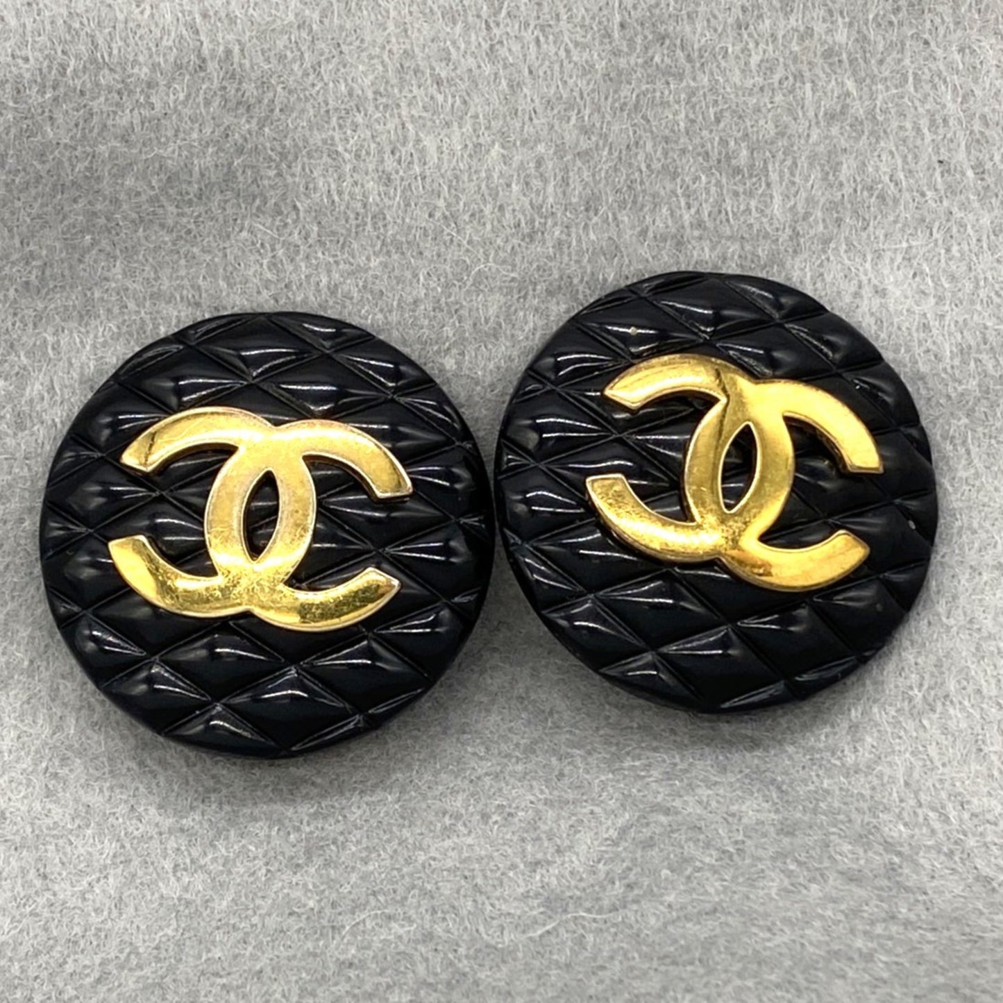 CHANEL Matelasse Coco Mark Earrings in Black and Gold