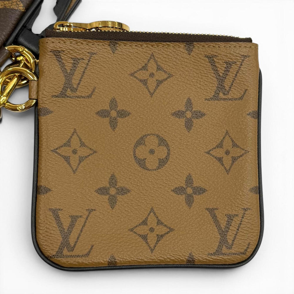 LOUIS VUITTON M68756 Monogram Giant Reverse Leather Pochette Trio Brown Made in France Women's with Dust Bag — Like New