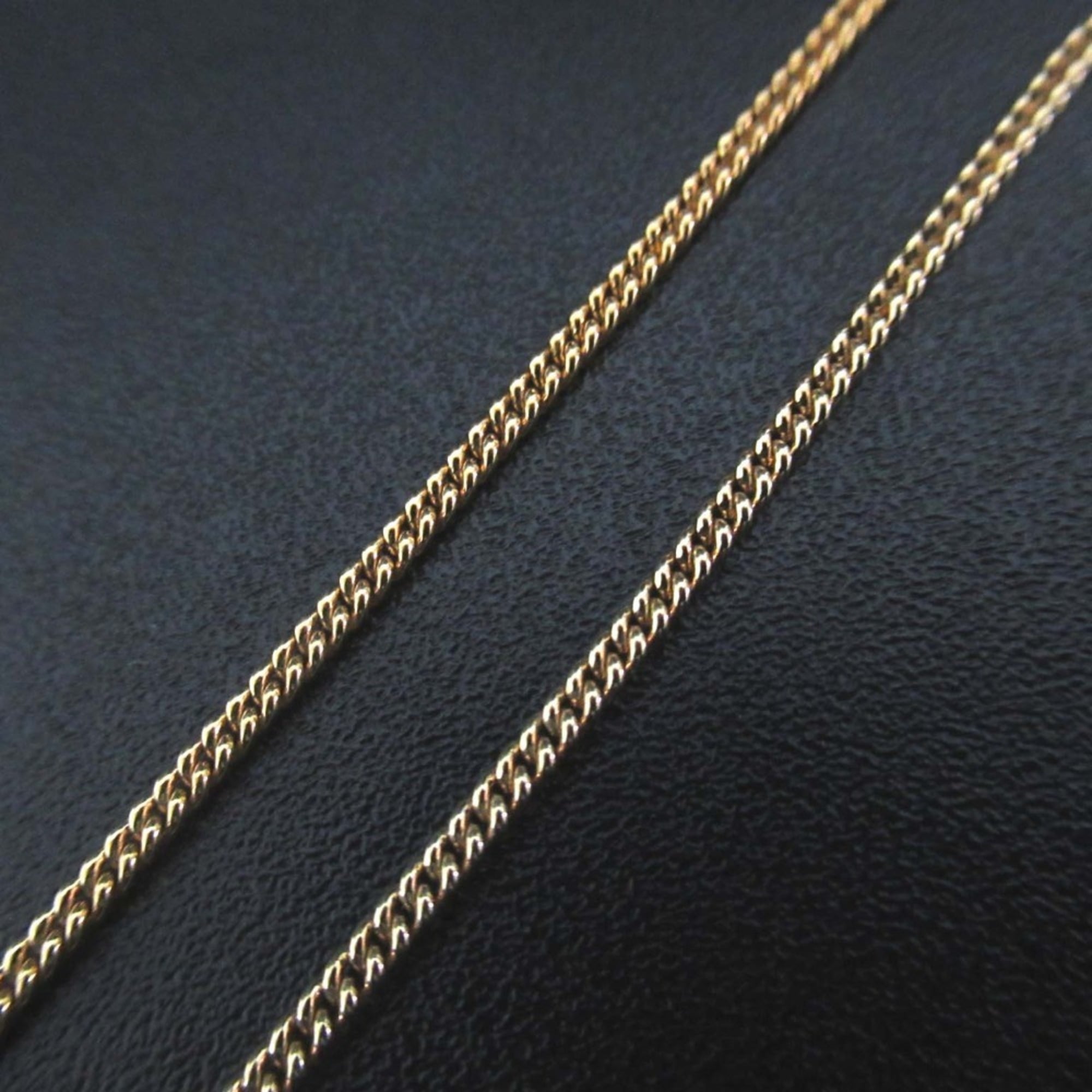 Vintage Christian Dior logo chain necklace pendant in GP gold for women.