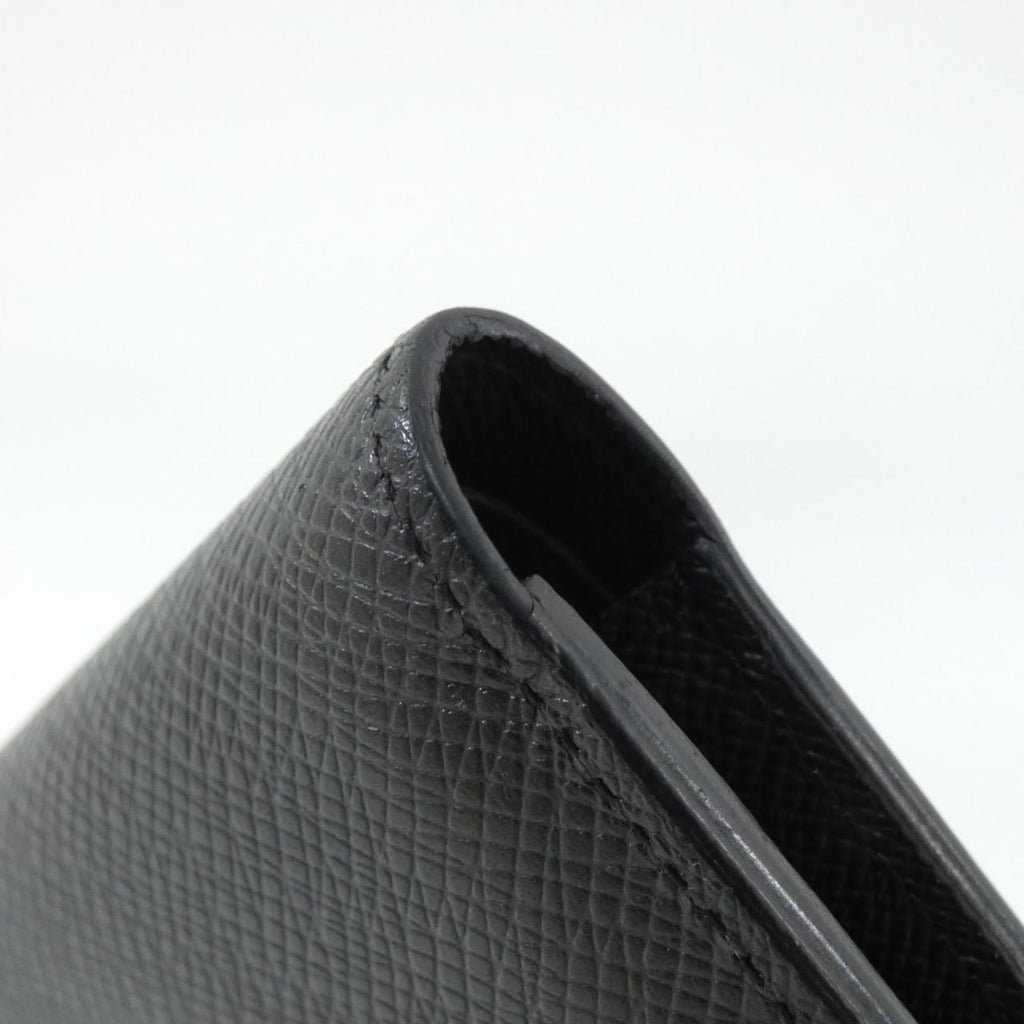 Louis Vuitton Taiga Portefeuille Multiple M30531 Billfold