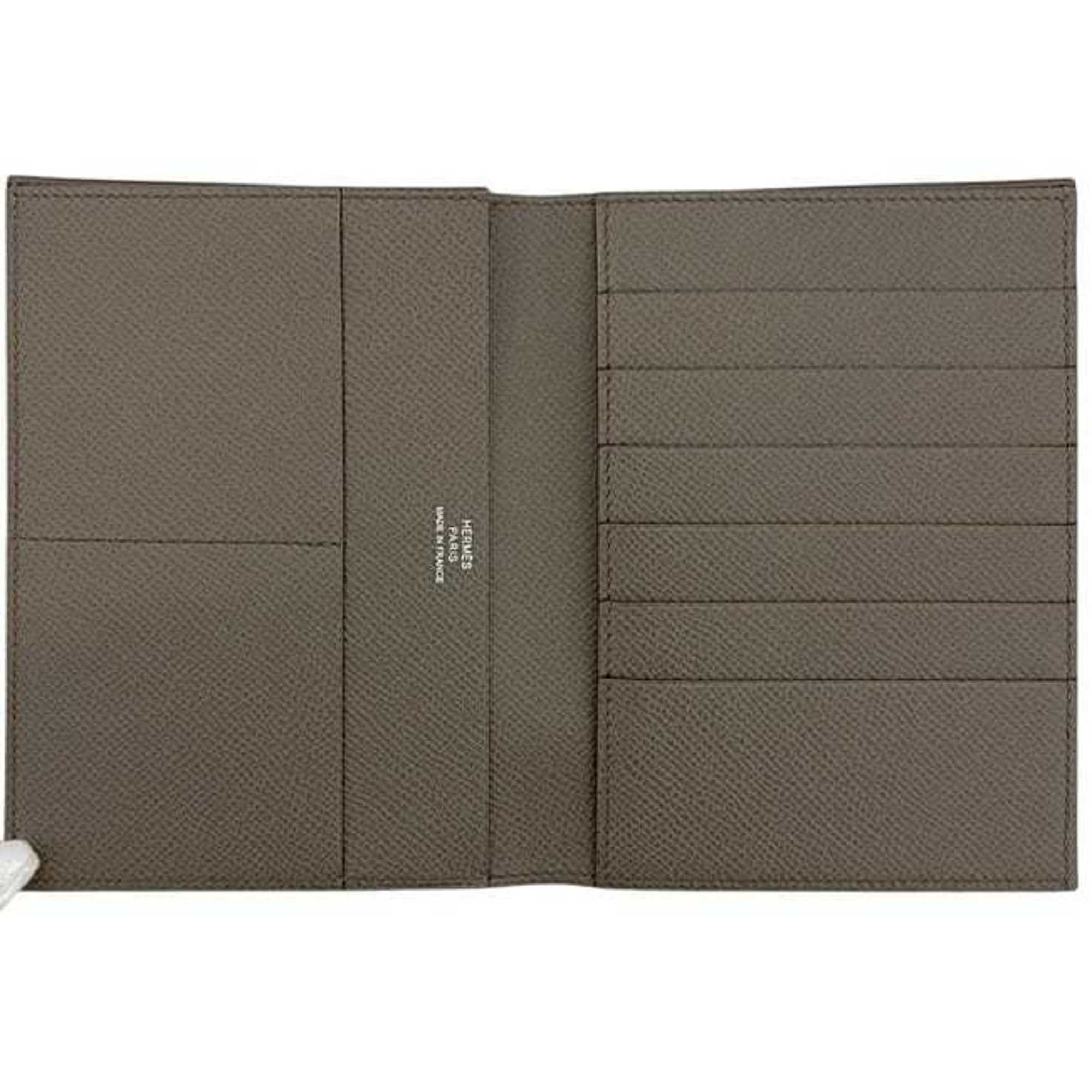 Hermes Hermès MC Fleming bifold wallet (f-24632) in greige leather with Epson Tourtiere logo and T-stamp. This genuine grained is available gray beige. Suitable for both men women.