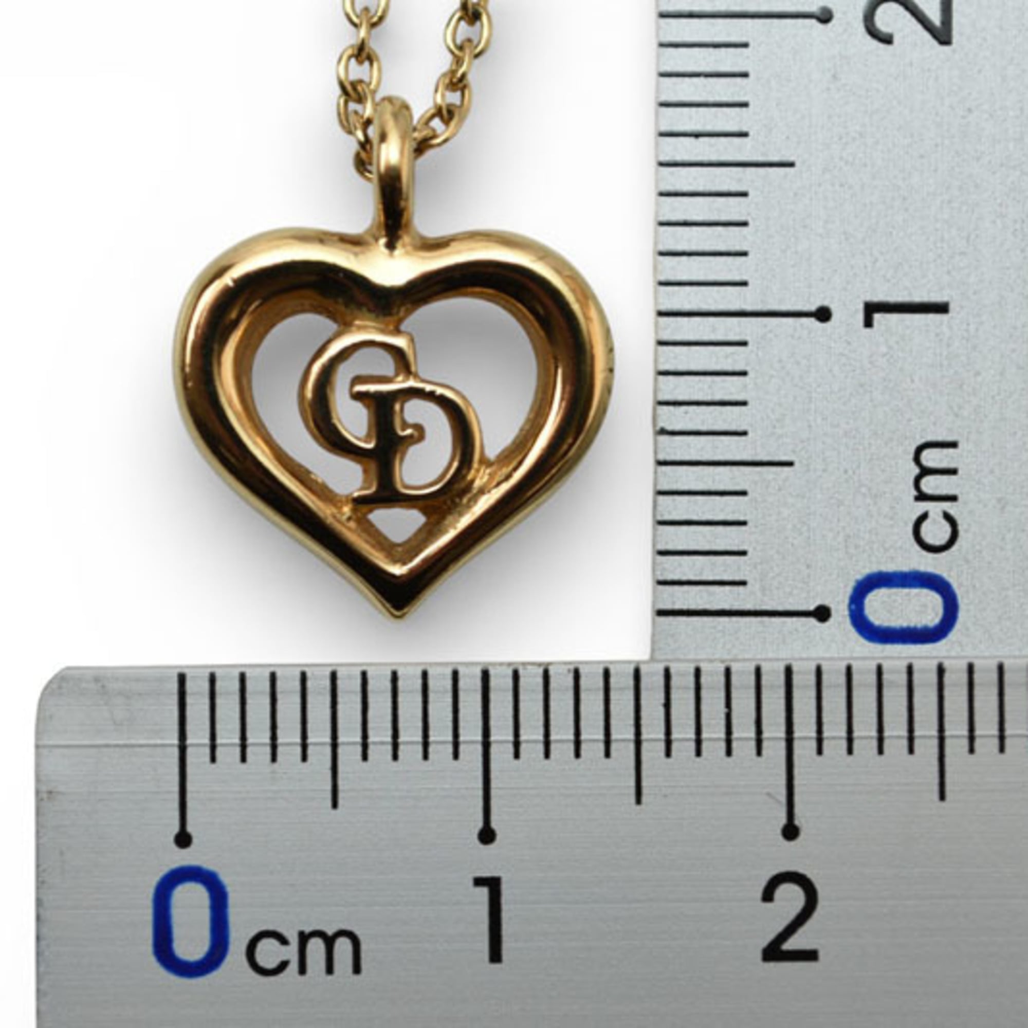 Christian Dior necklace pendant with heart motif in gold