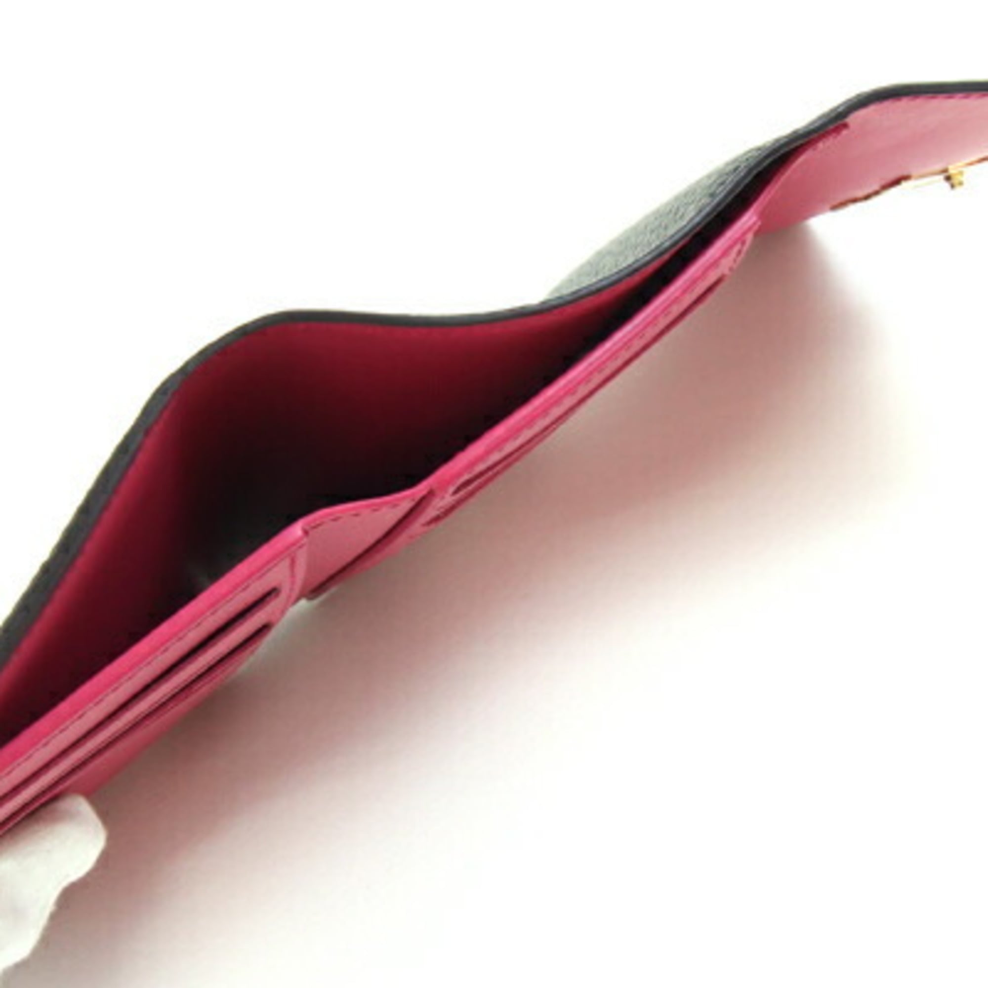 Louis Vuitton Portefeuille Capucines Compact Tri-fold Wallet M62157 in Noir and Hot Pink Taurillon Leather. LV Wallet, Two-Tone Design. Women's. LOUIS VUITTON