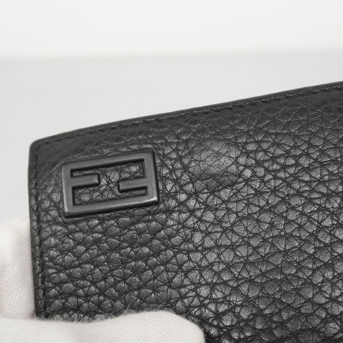 Fendi tri-fold wallet in black leather for men