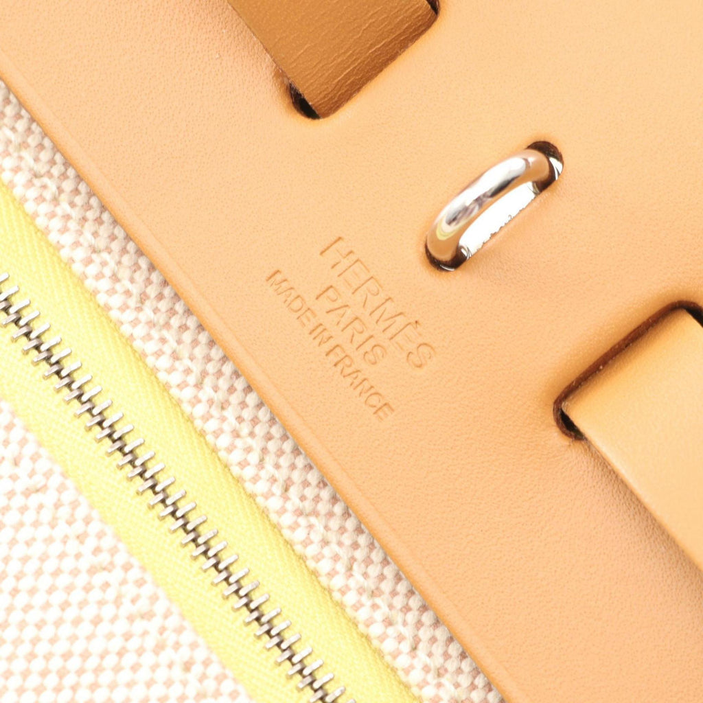 Hermes Hermès Airbag Zip PM handbag, canvas and leather, toile twill ash Berline, Vache Hunter, women's, yellow brown.